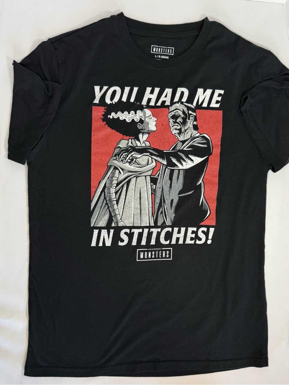 Universal Black 'You Had Me In Stitches' Graphic Tee with Red Accent